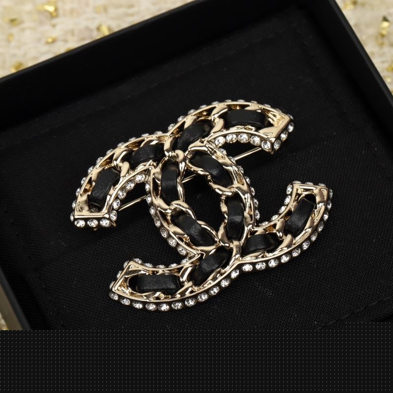 Ch*el brooches